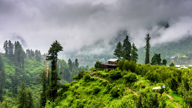 Beautiful Parvati valley covered with clouds during the monsoon season