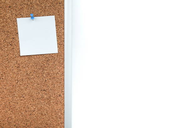 istock cork board with white empty note of paper and copy space 1193124767