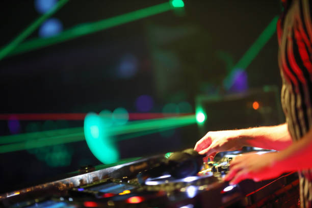 istock Dj mixing in night club 1193124900