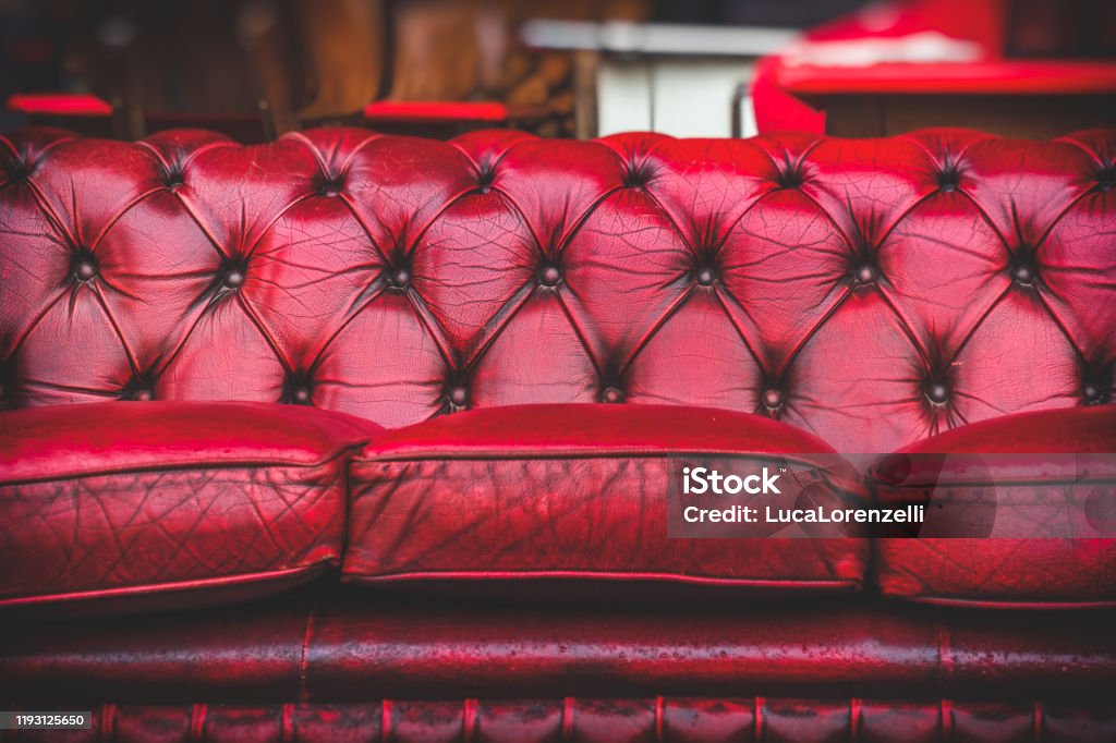 empty red sofa in cosy lounge room old-fashioned vintage closeup empty red sofa in cosy lounge room old-fashioned vintage closeup . Armchair Stock Photo empty red sofa in cosy lounge room old-fashioned vintage closeup empty red sofa in cosy lounge room old-fashioned vintage closeup . Armchair Stock Photo