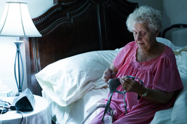 istock Woman attaching C-pap 1193125906