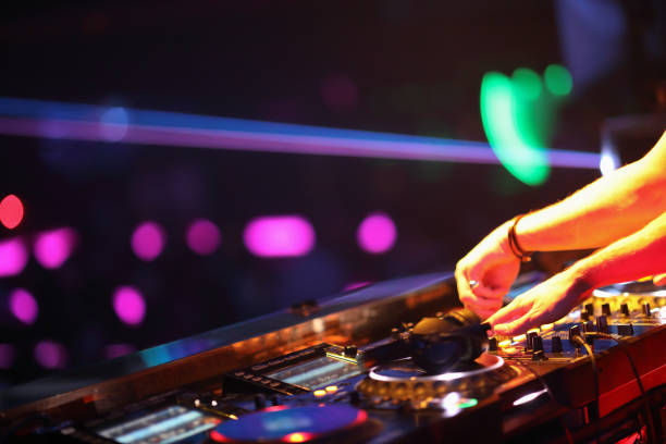 istock Dj mixing in night club 1193125909