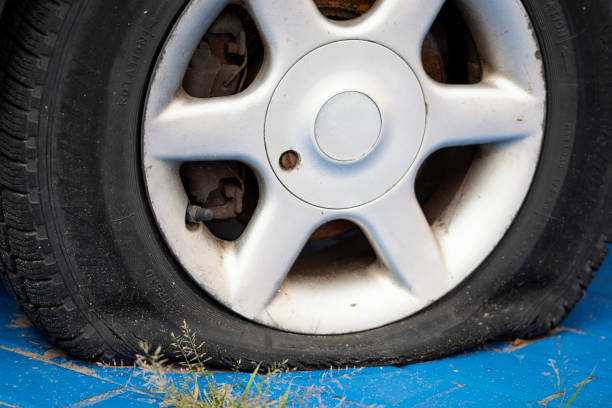 istock Car's flat tire. 1193126064