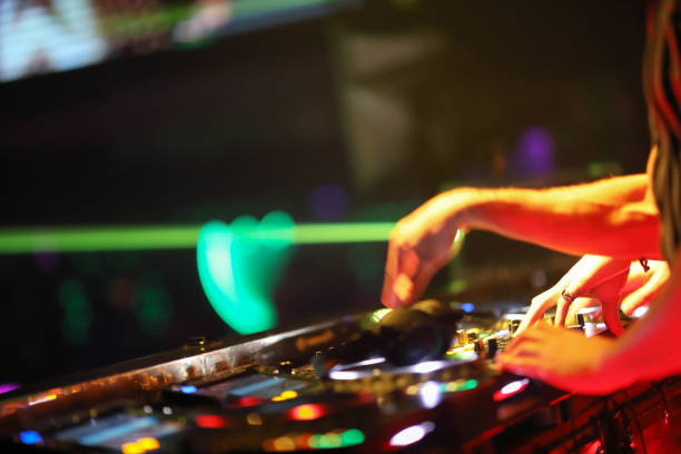 istock Dj mixing in night club 1193126313