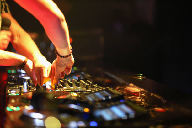 istock Dj mixing in night club 1193126343