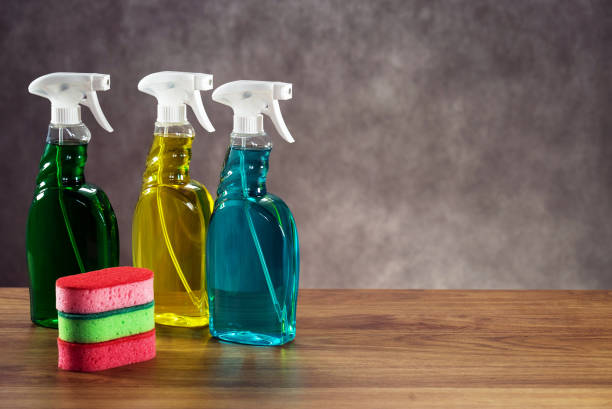 istock House cleaning product on wood table 1193128612