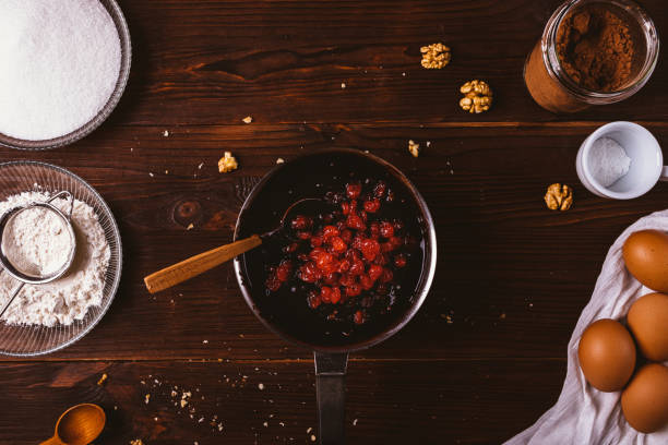 istock Melted chocolate with nuts and dried cherries 1193128889