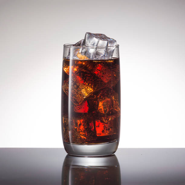 istock Cocktail with rum with cola and ice, close-up 1193130581