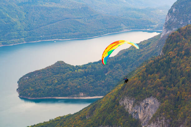 istock A paraglider flies over Molveno Lake. 1193131699