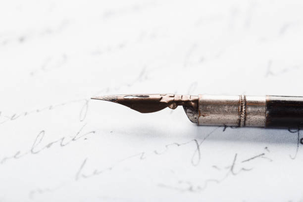 istock fountain pen on paper with ink text closeup 1193137297