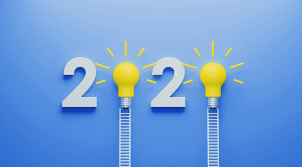 istock White Ladders and Yellow Lightbulbs Forming 2020 on Blue Wall 1193139995