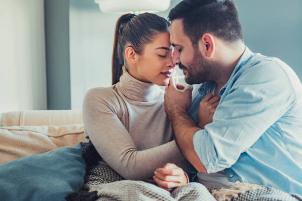 istock Young couple at home falling in love 1193145264