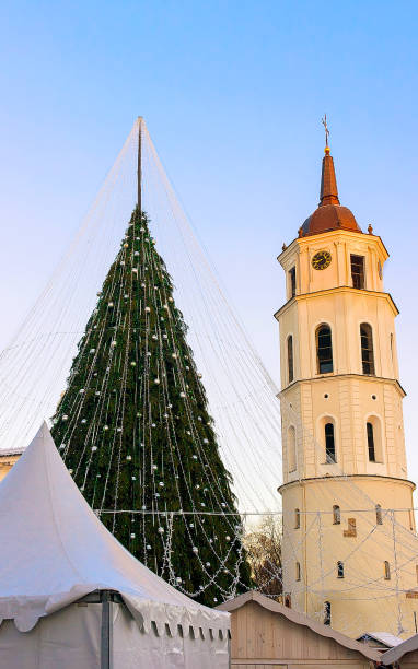 istock Christmas tree and Cathedral bell tower Lithuania Vilnius Advent reflex 1193153535
