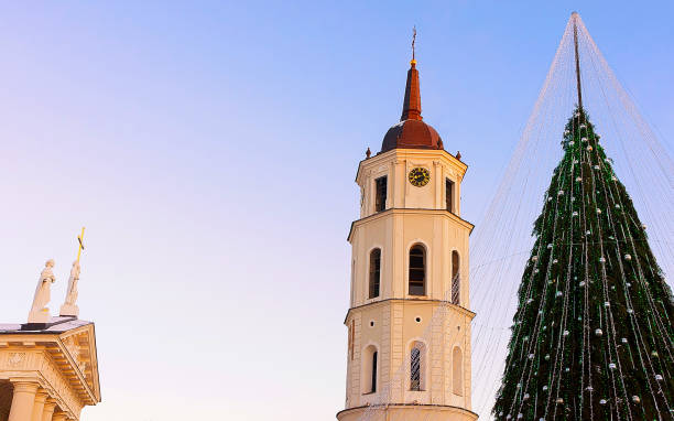 istock Christmas tree and Cathedral bell tower Lithuania Vilnius During Advent reflex 1193155430