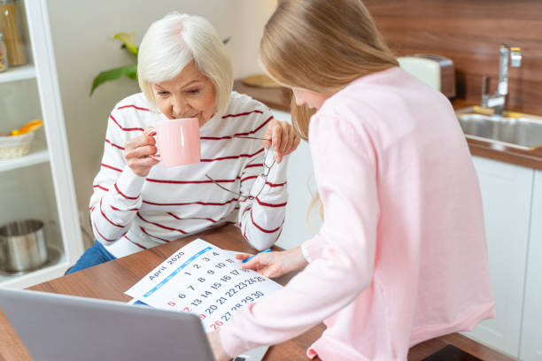 istock Woman drinking coffee at the kitchen table 1193156332