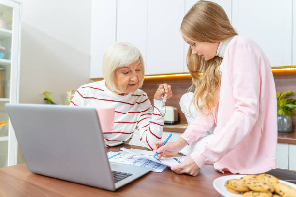 istock Young lady filling in an application form 1193156338