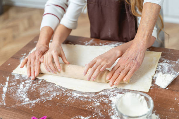 istock Two female cooks working in the kitchen 1193156426