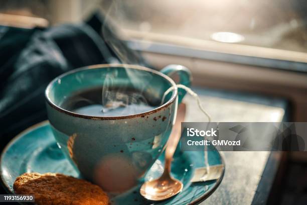 Cup Of Black Tea Served With Biscuits Stock Photo - Download Image Now - Tea - Hot Drink, Tea Crop, Afternoon Tea