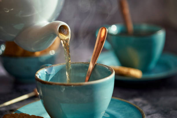 istock Cup of Black Tea Served with Biscuits 1193156955