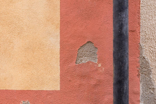 istock Abstract view on a wall with spot and a tube 1193158976