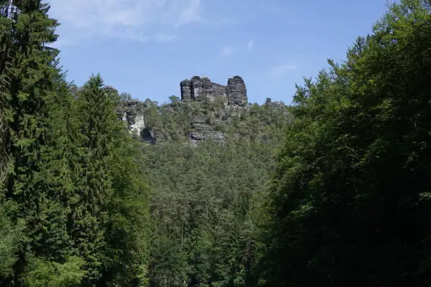 Elbesandstone rock formation spotted from the Amselgrund in Saxon Switzerland, Germany