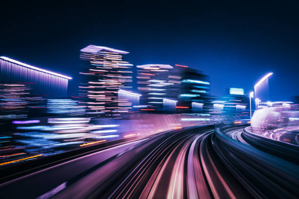 istock Futuristic High Speed Light Tail with Night City Background 1193163967