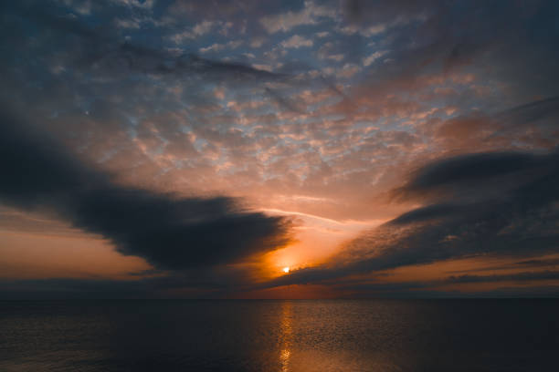 istock sunset over the sea 1193165432
