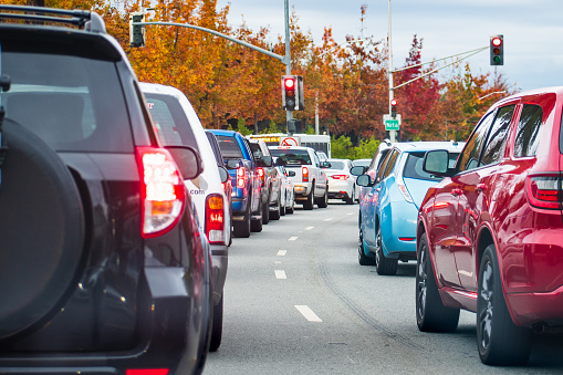 Heavy afternoon traffic in Mountain View, Silicon Valley, California; cars stopped at a traffic light