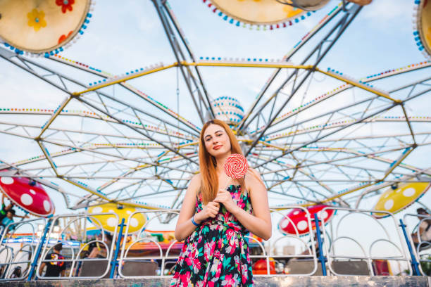 istock Woman in the amusement park 1193169181
