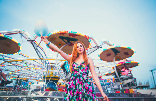 istock Woman with cotton candy 1193169298