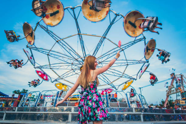 istock Woman in amusement park 1193169915