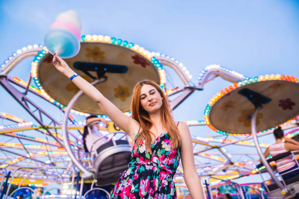 istock Woman holding cotton candy 1193169923