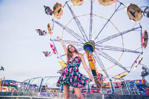 istock Girl in amusement park 1193169976