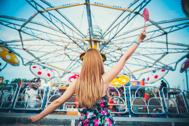 istock Woman in amusement park 1193170073