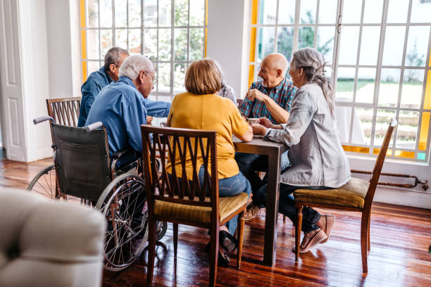 istock Seniors people discussing at retirement home 1193172882