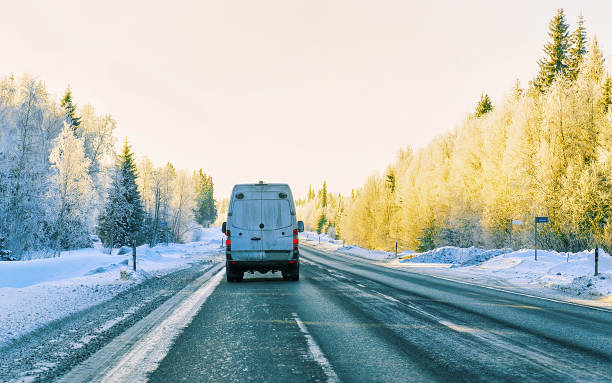 istock Minivan on road in winter Rovaniemi reflex 1193173654