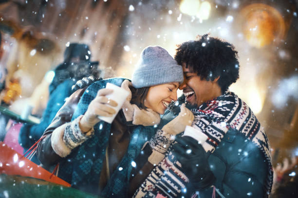 istock Couple enjoying snowy December night 1193175007