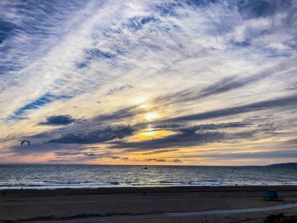 Wispy sunset skies over the pacific ocean