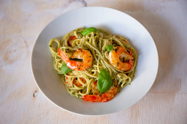 istock Spaghetti with prawns and pesto sauce 1193192379