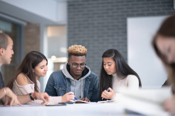 istock University Students Sharing Ideas stock photo 1193192531