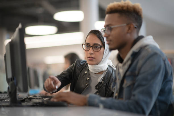 istock University Students Studying Online stock photo 1193192542