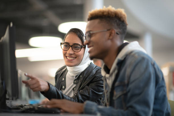 University Students Studying Online stock photo
