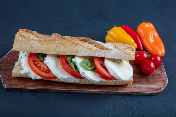 istock Sandwich with basil sauce, fresh lettuce, tomato and mozzarella. 1193193578