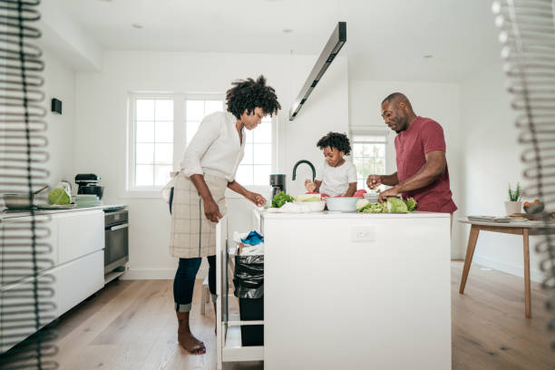 istock Brazilian family  having fun in the kitchen 1193199364