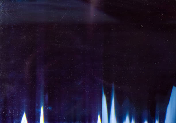 istock dusty overlay blue glowing lights scratches dark 1193199462