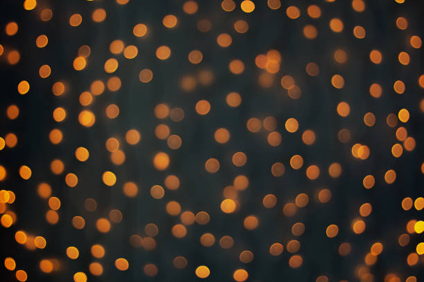 istock Abstract blur golden bokeh light Christmas holiday background 1193199589