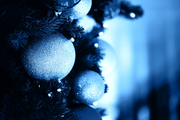 istock Fir branch with balls and festive lights 1193200162