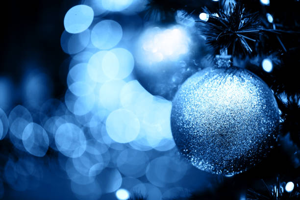 istock Fir branch with balls and festive lights 1193200165