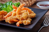 Fried shrimp and vegetable on plate