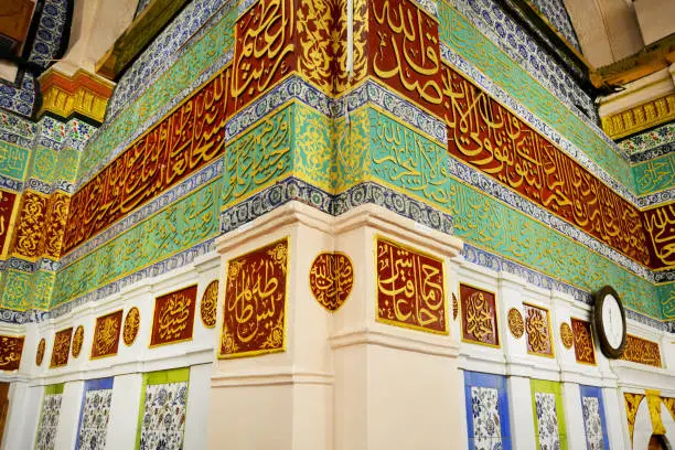Photo of Medina/Saudi Arabia - May 30, 2015: Prophet Mohammed Mosque, Arabic Calligraphy Inscriptions and Islamic art ornament